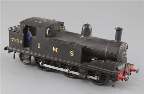 A Leeds Model Co 0-6-2 LMS tank locomotive, number 7709, black livery, 3 rail, overall 23cm, needs attention